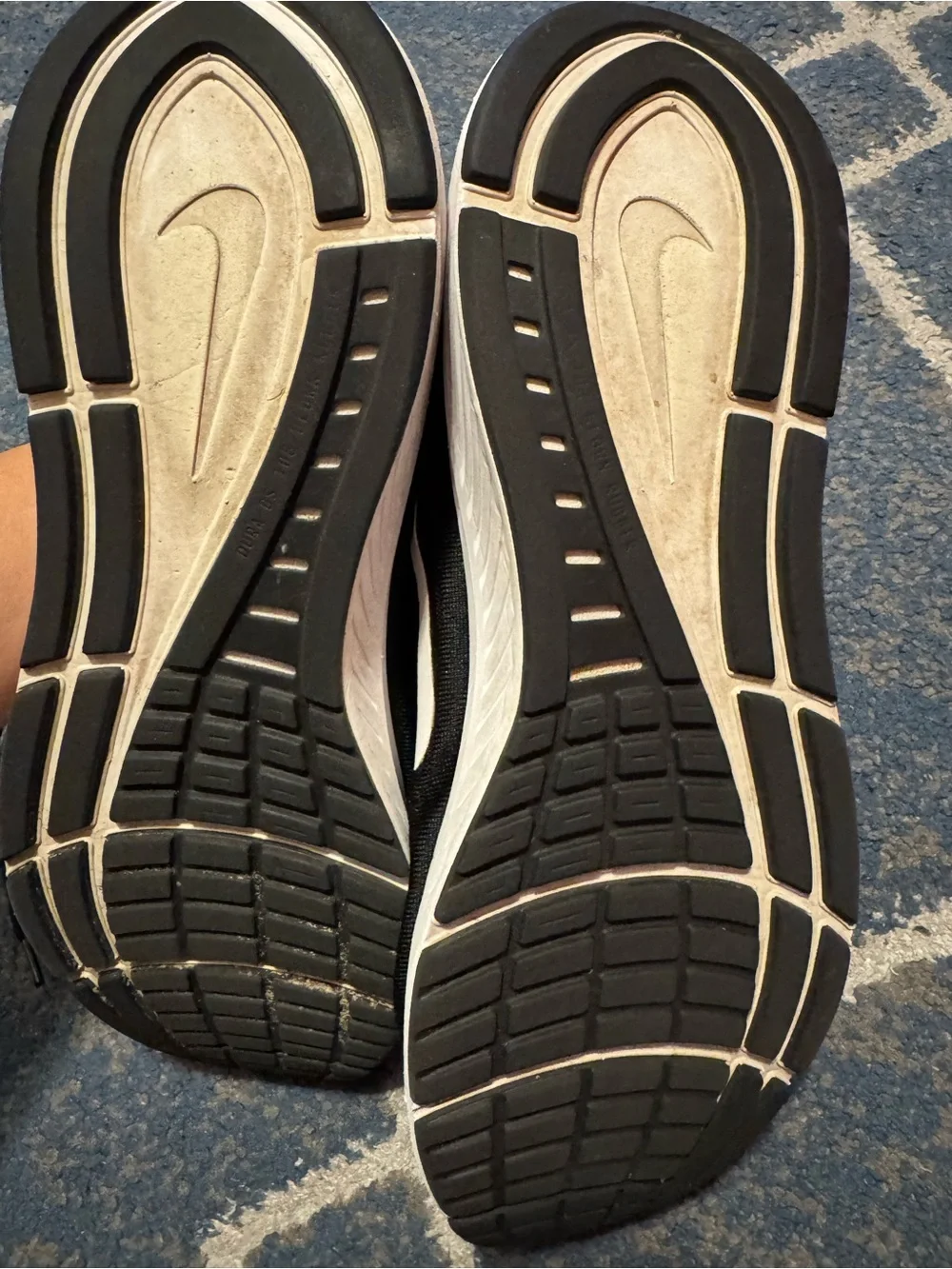 Nike Black Athletic Running Shoes with White Swoosh
